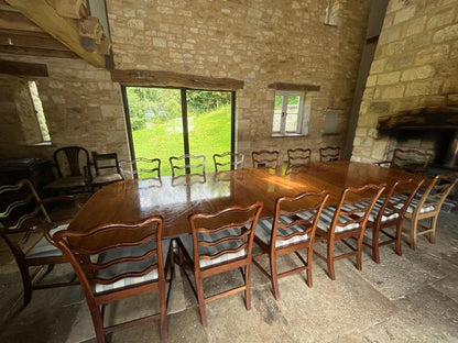 Set of Fourteen (14+2) Dining Chairs in the Manner of Thomas Chippendale